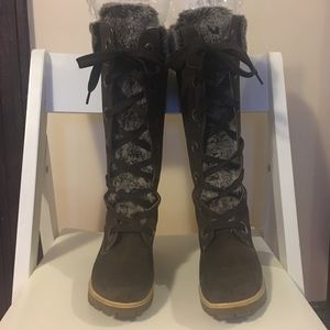 Tall Timberland winter boots with faux fur
